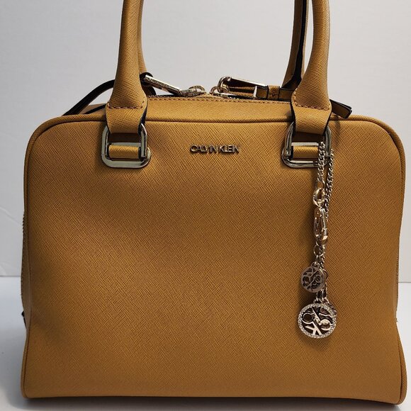 Calvin Klein Handbags - Calvin Klein Mustard Colored Satchel Purse